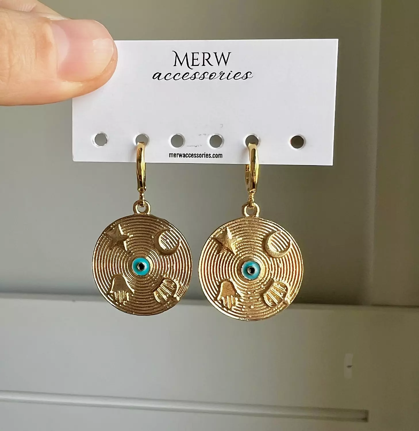 Gold eye earring  image