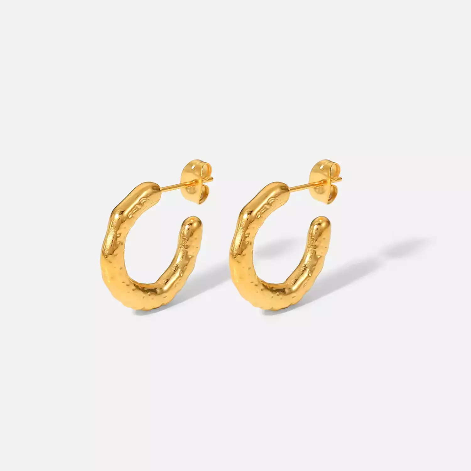 Irregular gold hoop earrings  image