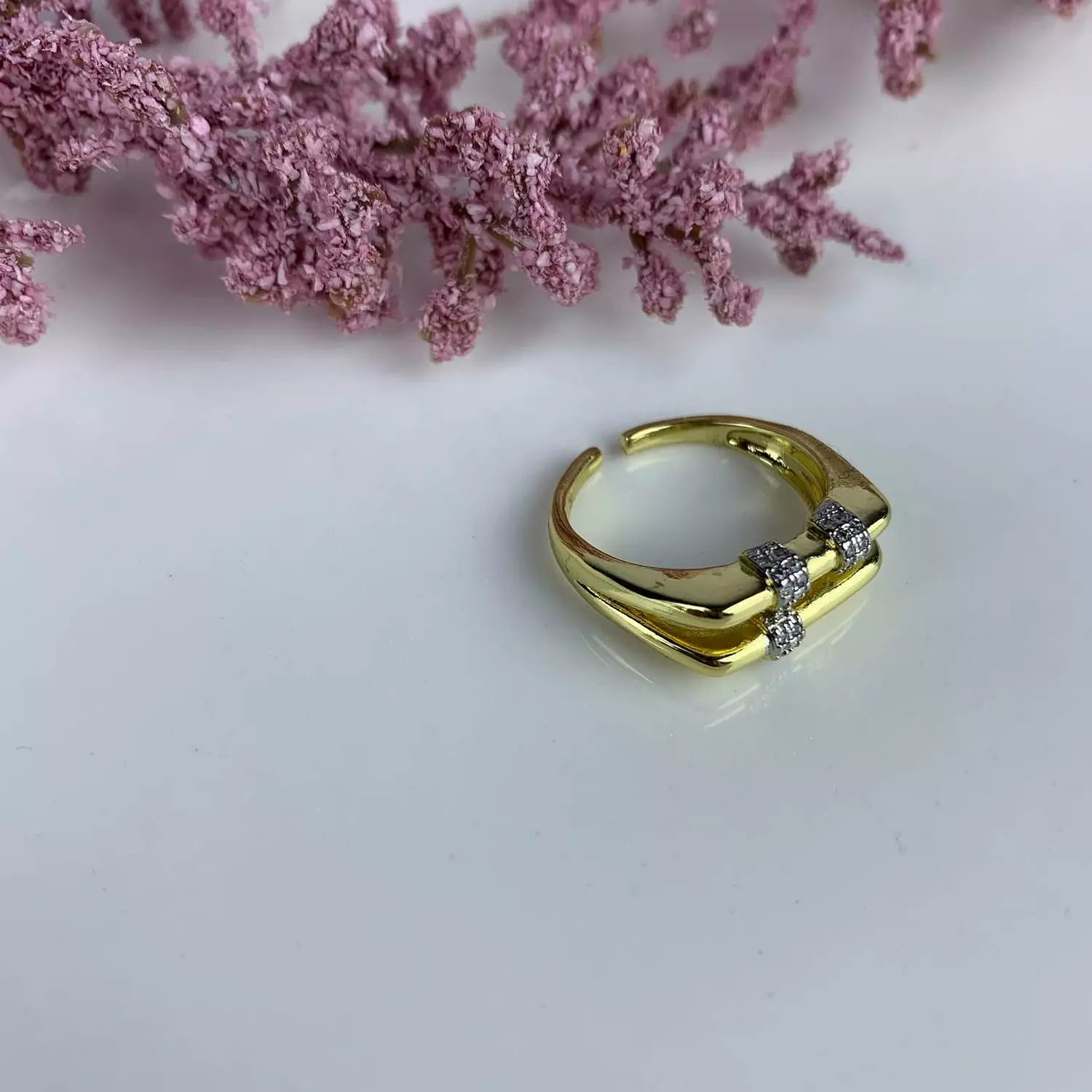 Gold pleated Ring with zircon diamonds hover image