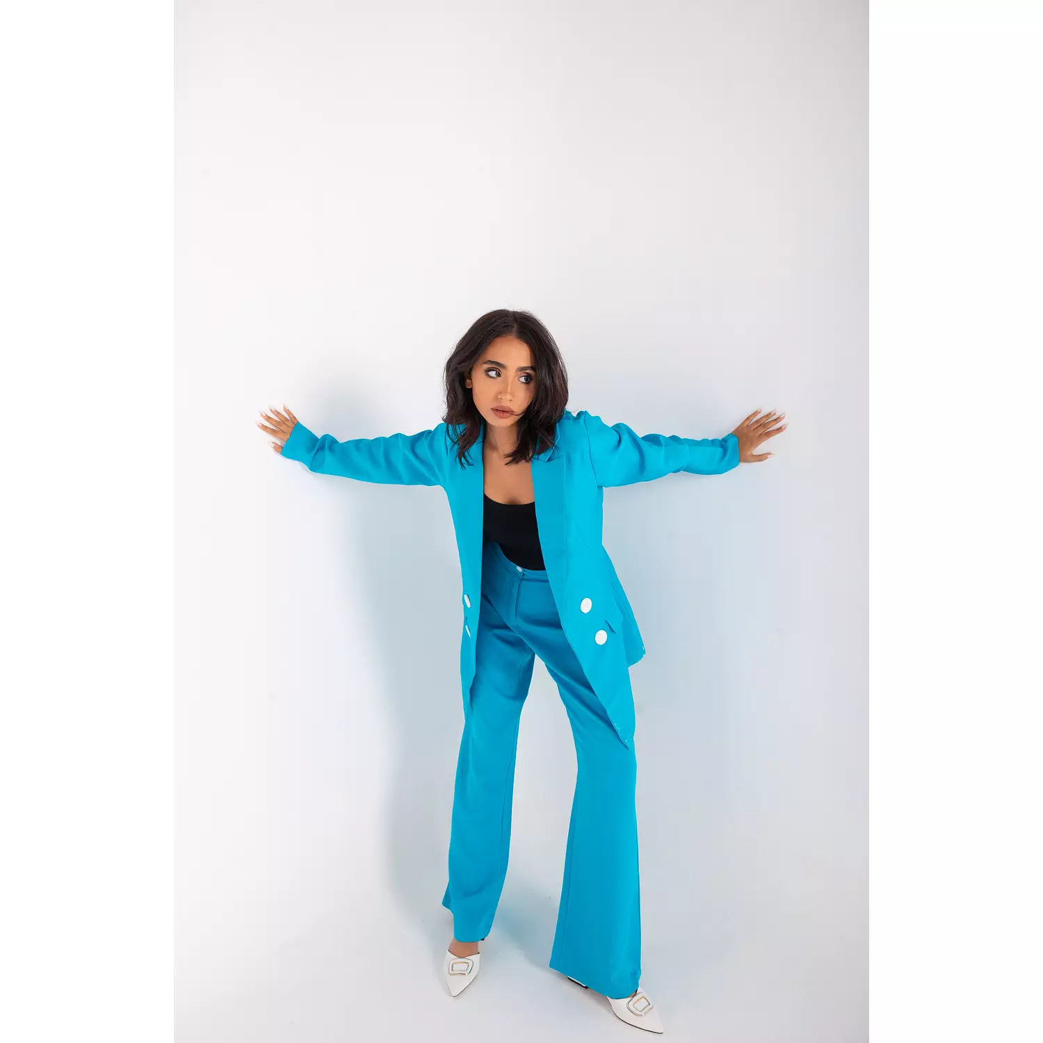 TURQUOISE SUIT image