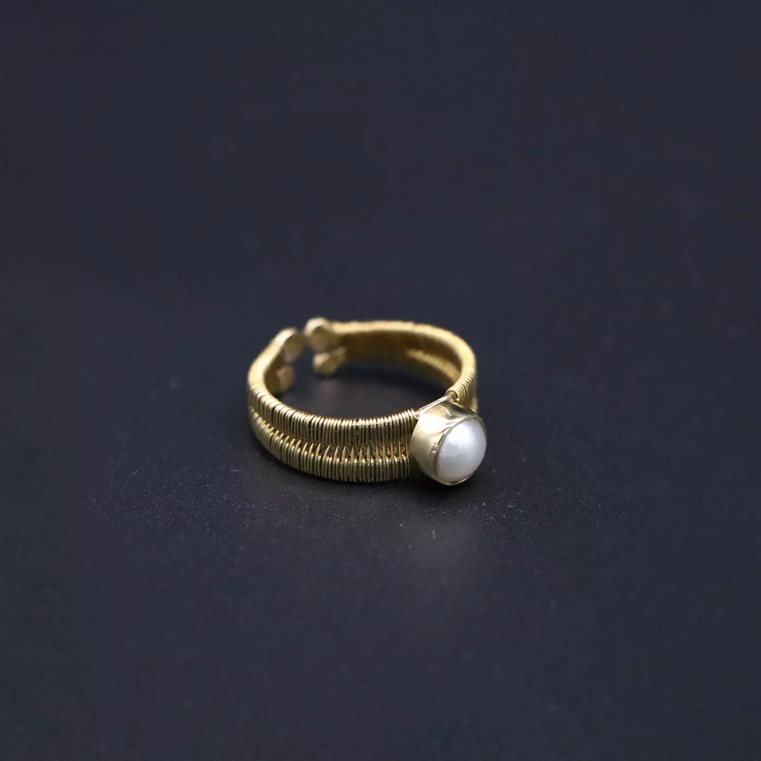 Handmade wire wrapped brass ring with pearl. image