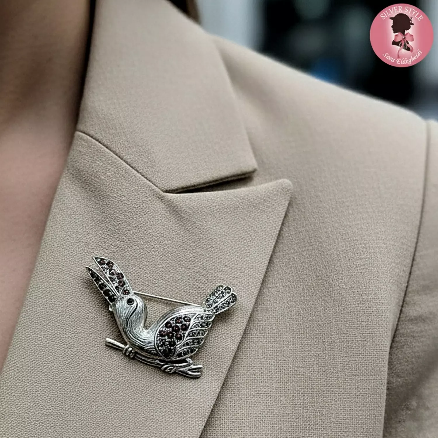 Bird with garnet stones image