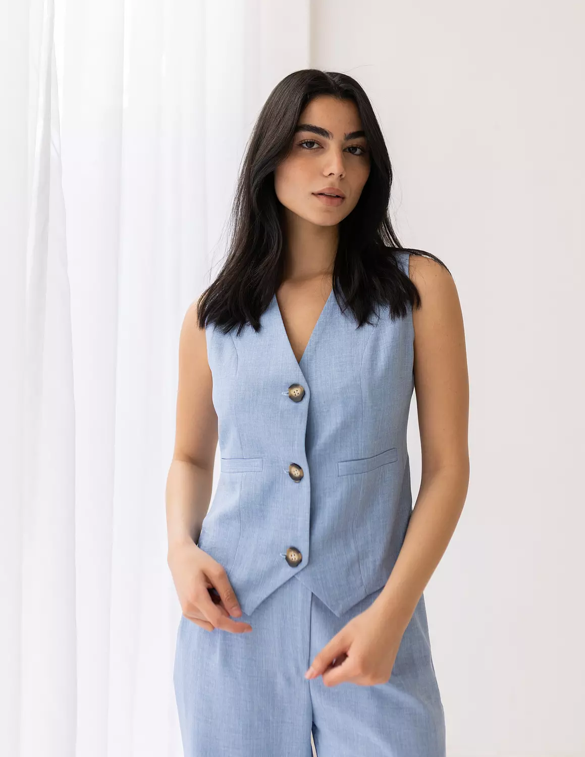 <p>Cropped Linen Vests</p>