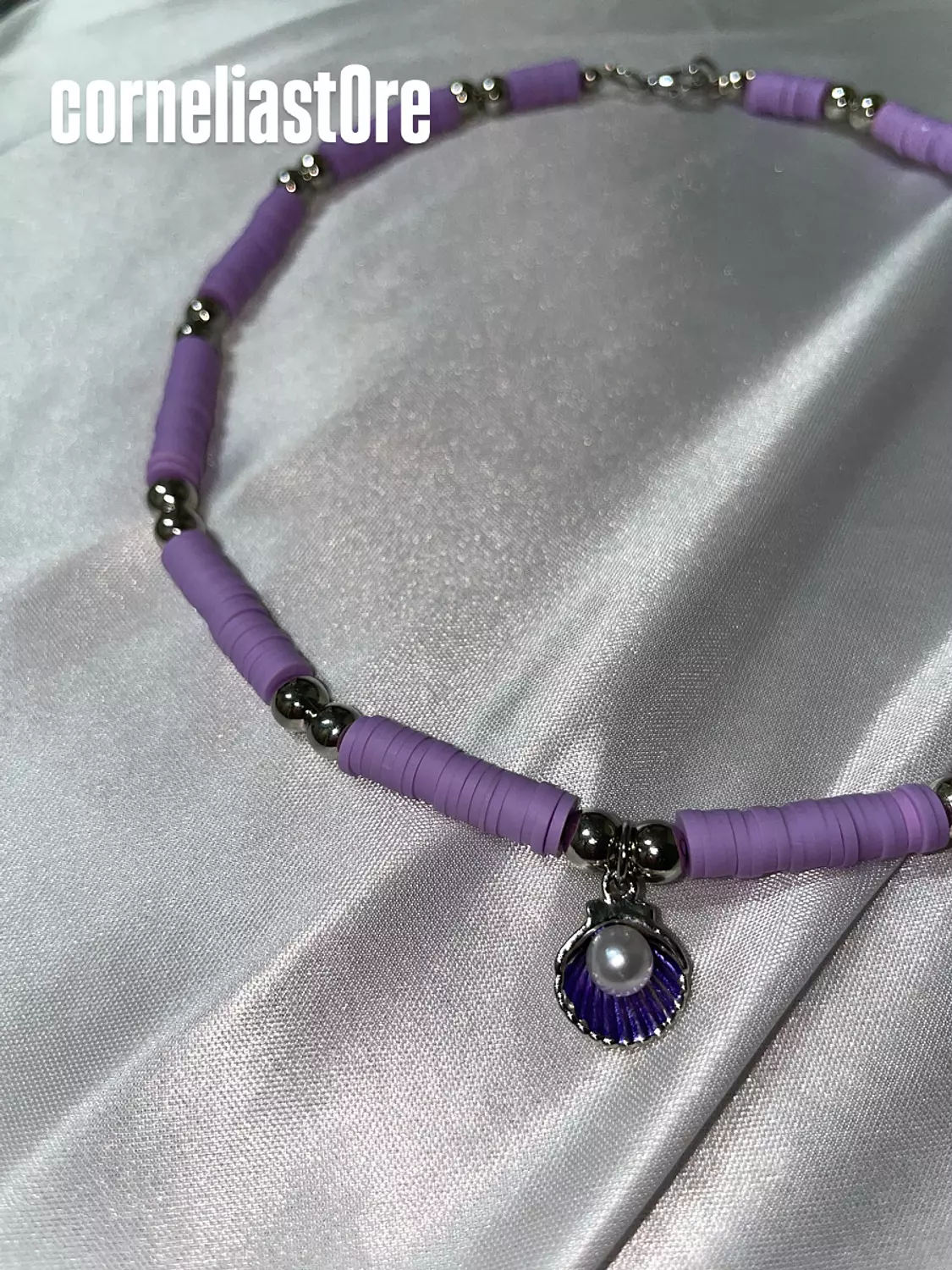purple pearls necklace . image