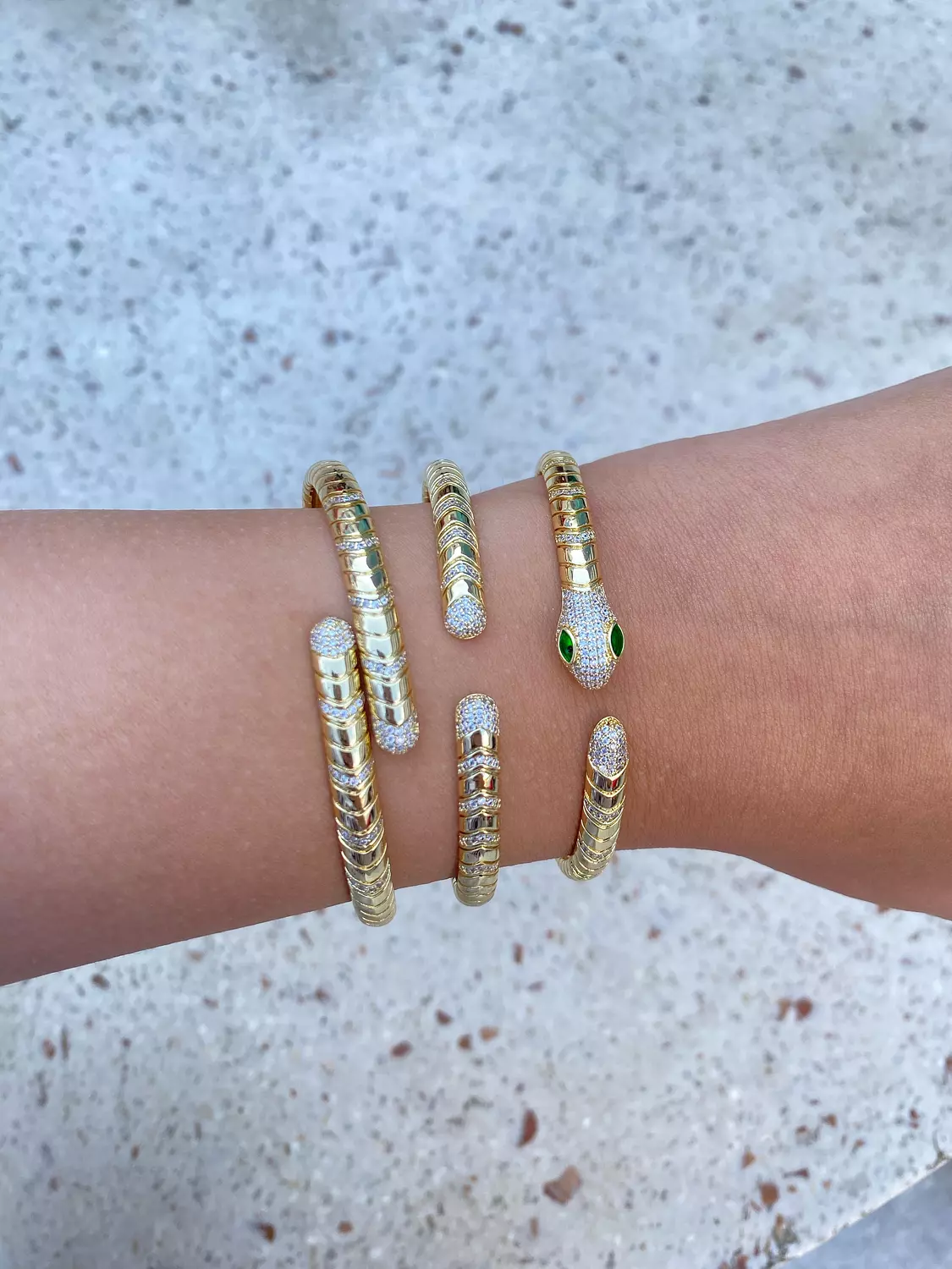 ‘The snake ’ gold platted bangles image