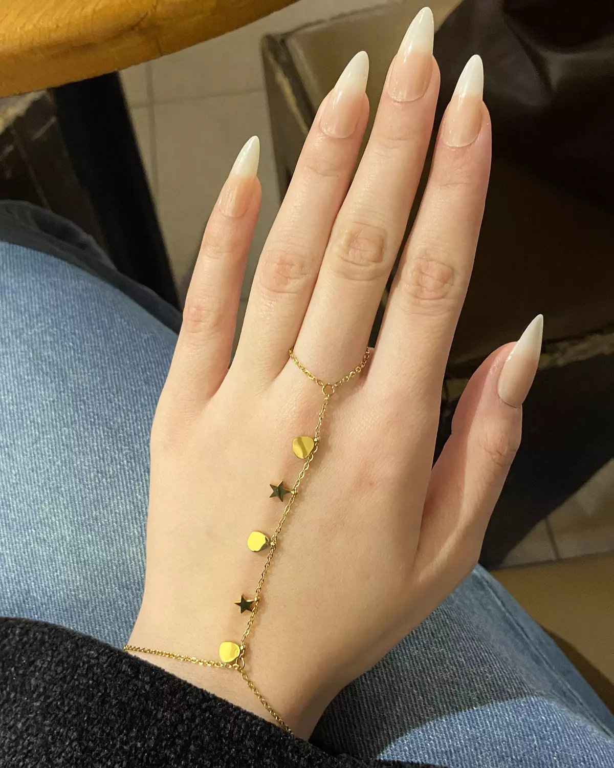 Stainless steel hand chain with heart and stars charms image