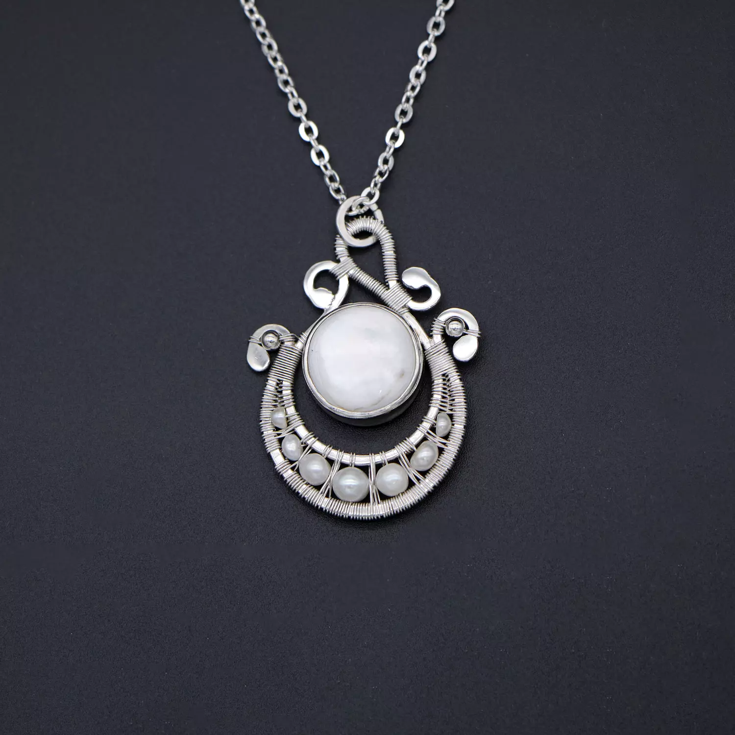  Silver pendant with mother of pearl. image
