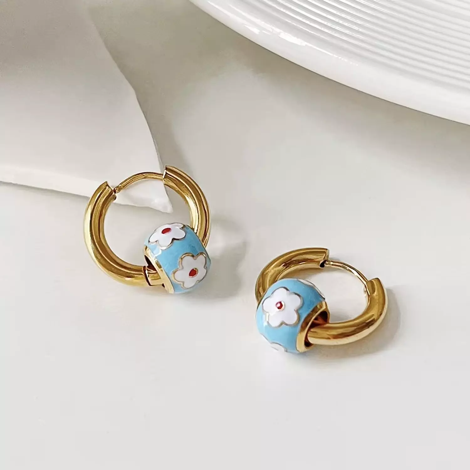 Turquoise flower hoop earrings  hover image