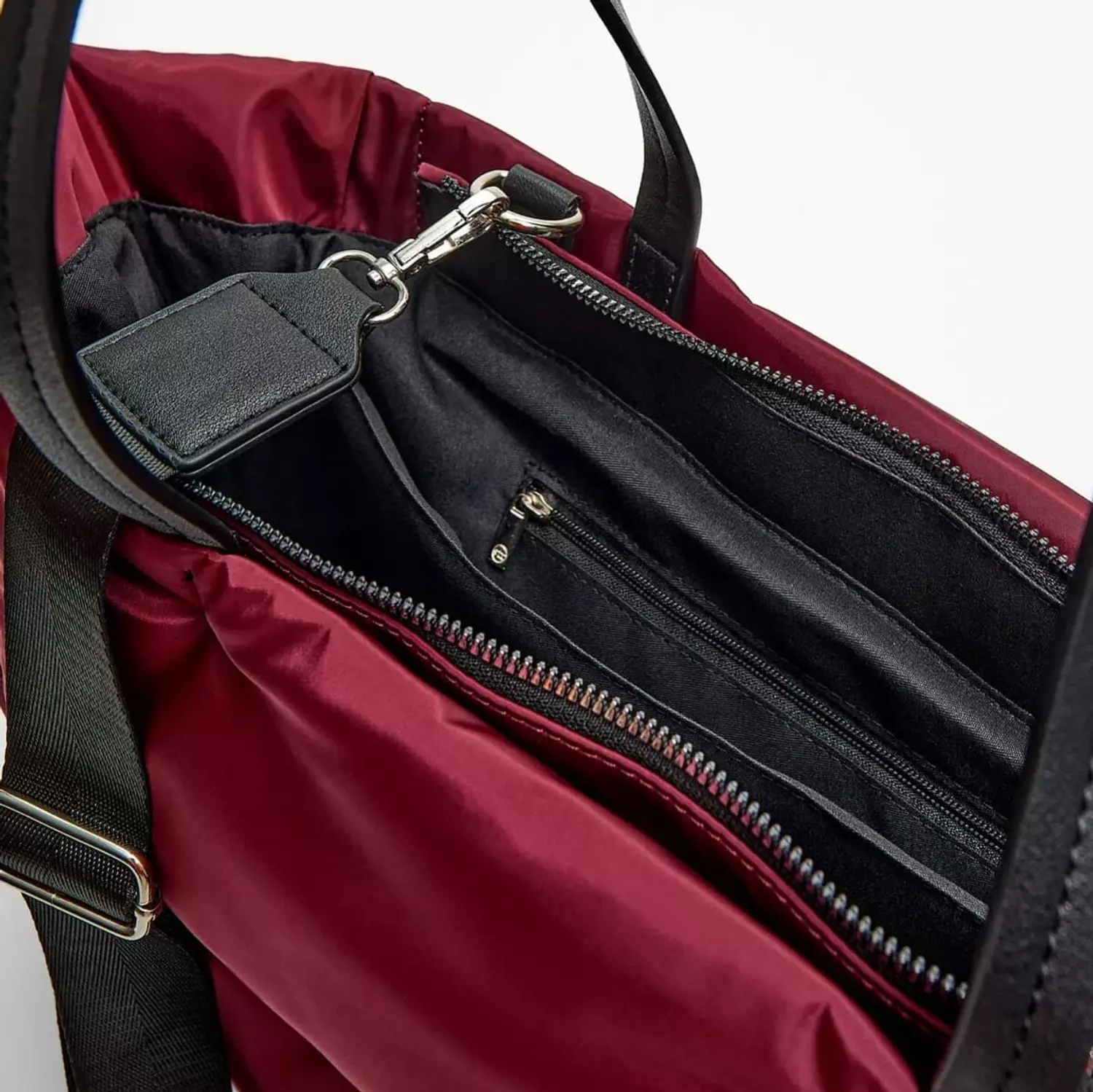 Burgandy Waterproof bag with strap hand hover image