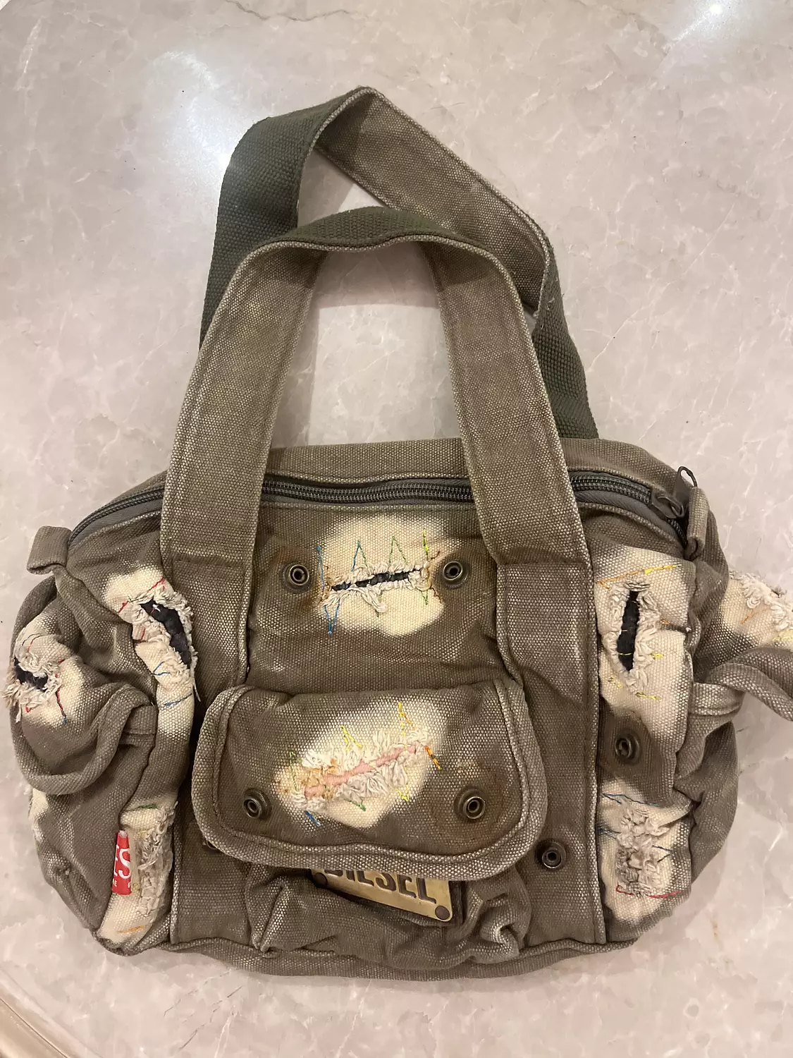 Olive washed out, ribbed diesel bag  image