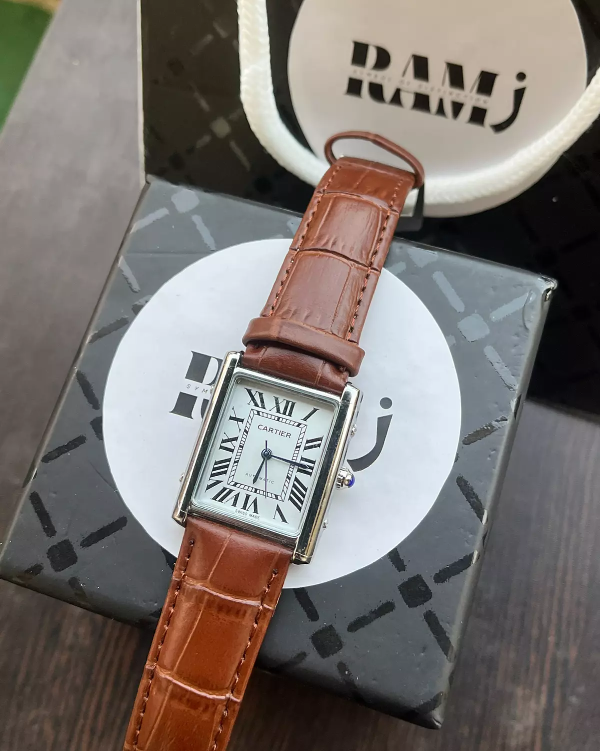Cartier old money brown image
