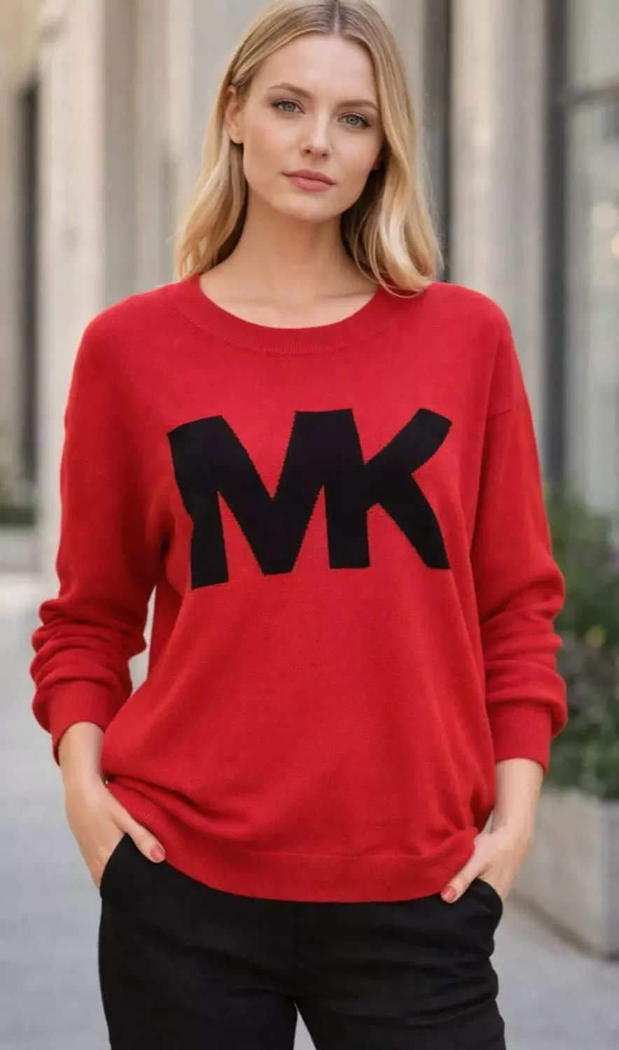 Michael Kors is the brand shown on the sweater. image
