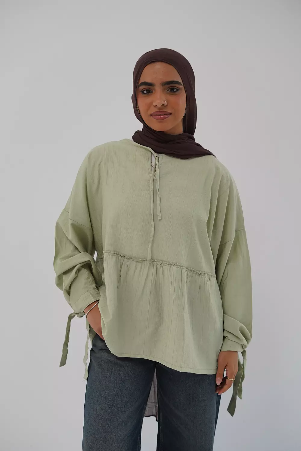 Mint blouse with tie from the collar image