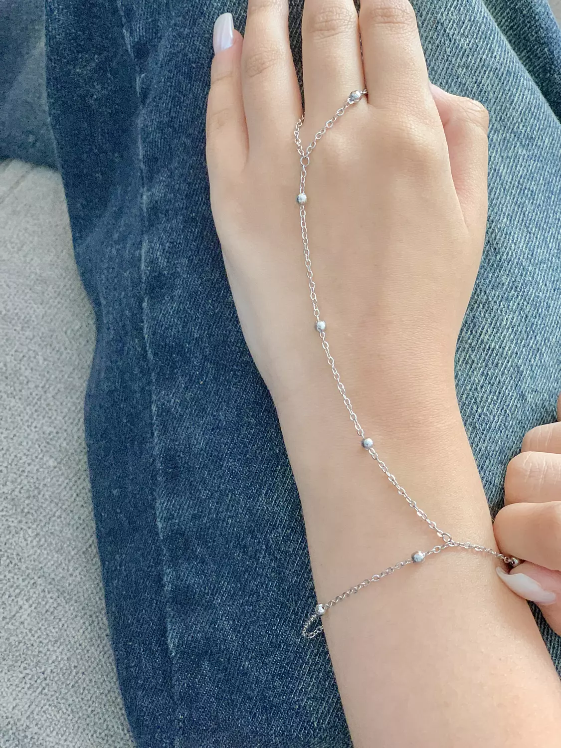 Silver beaded hand chain image