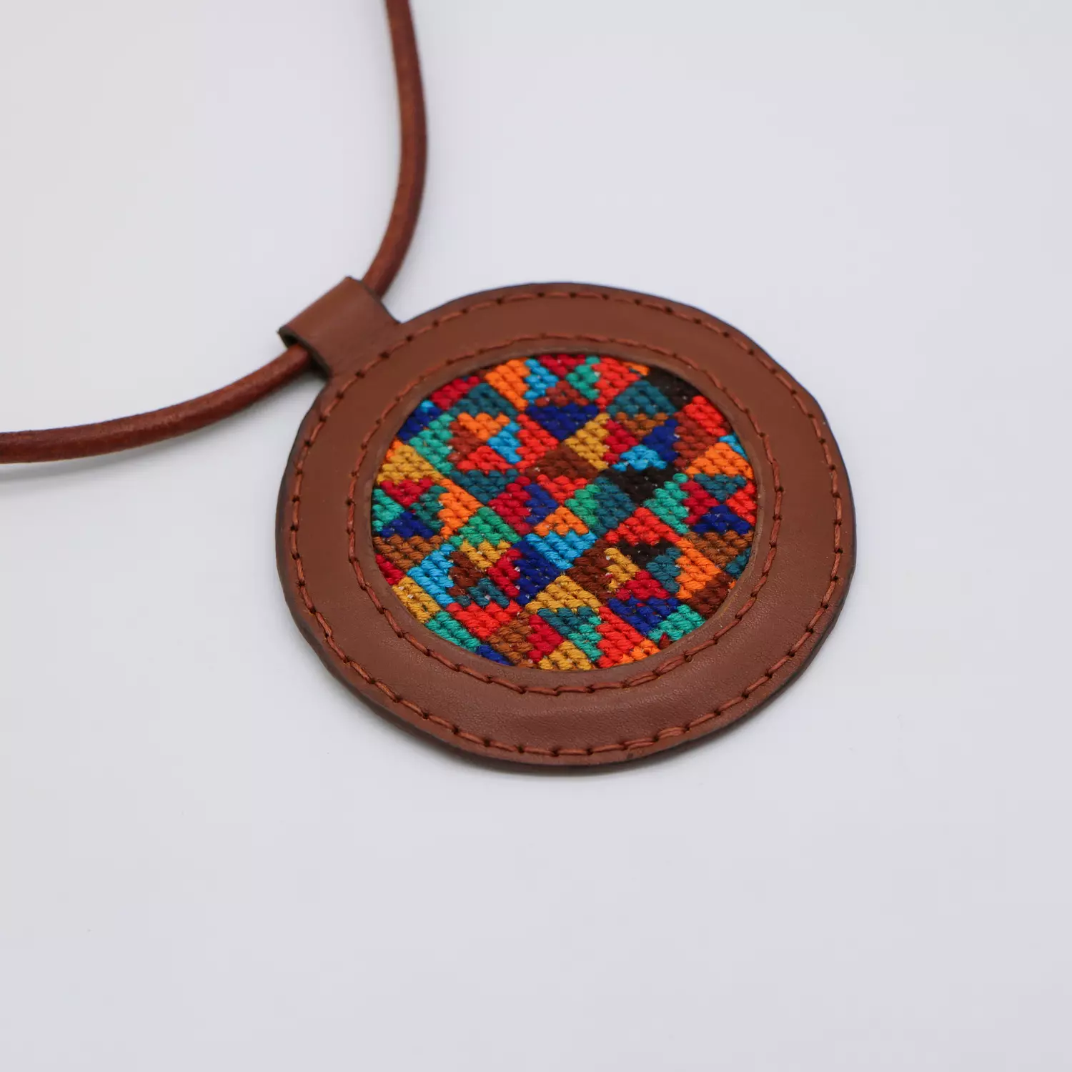 Genuine leather necklace with colorful Cross-stitching. image