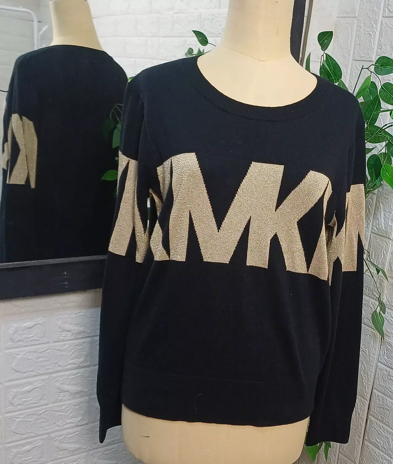 Michael kors black knit and the prominent gleaming  image