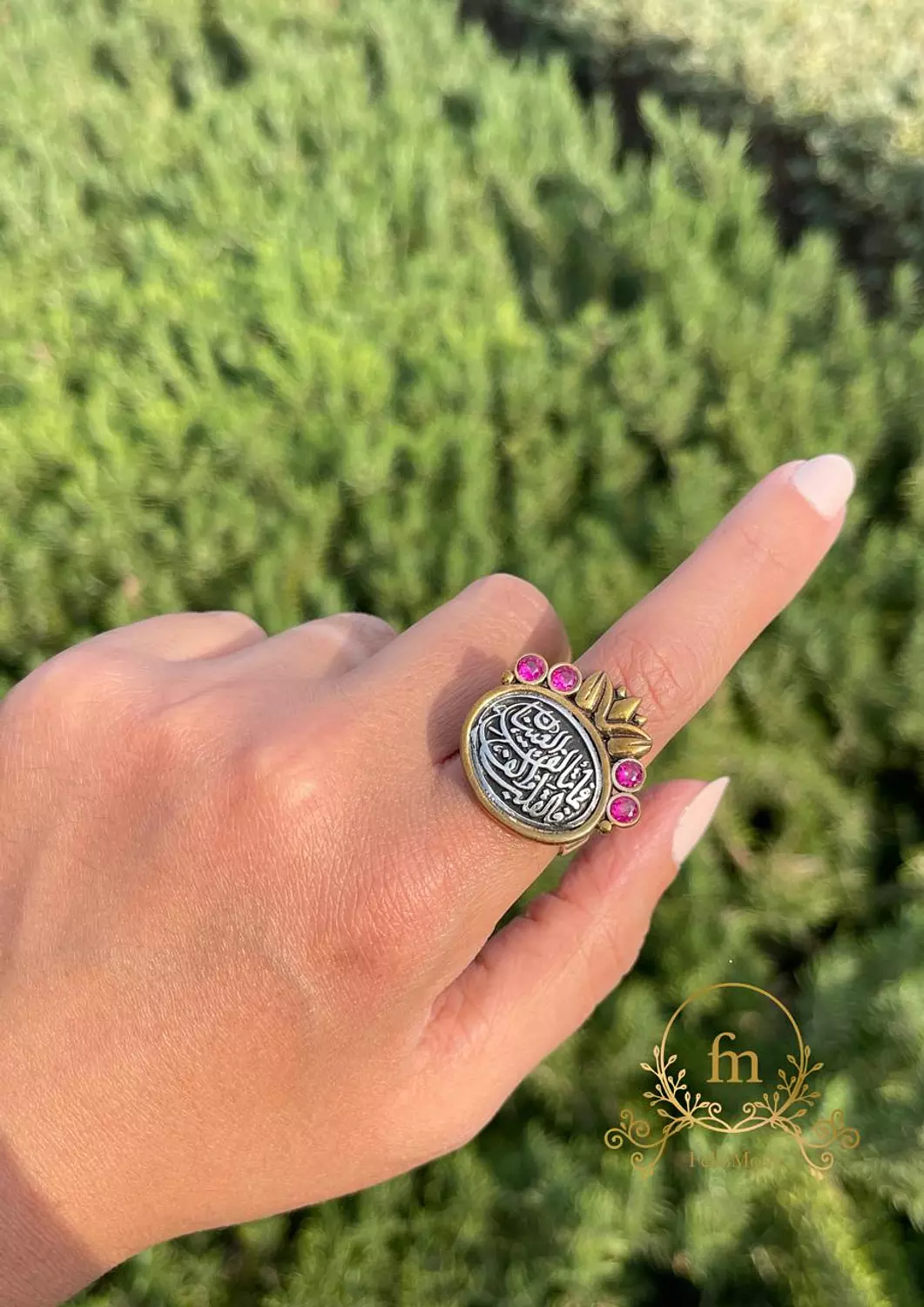 فما تألفه العين فالقلب الفه Silver ring gold plated with pink stones image
