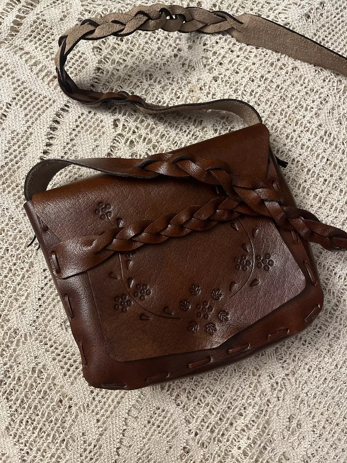 Tooled floral vines - braided strap leather bag hover image