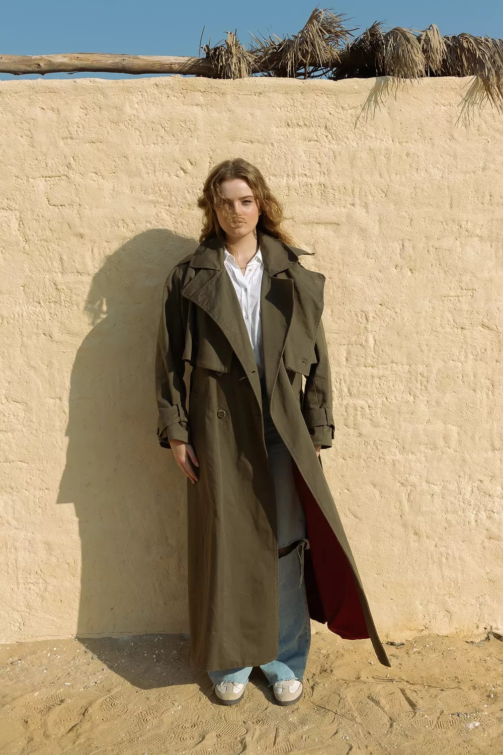 <p style="text-align: start"><strong>Convertible Trench Coat - Olive Green</strong></p>