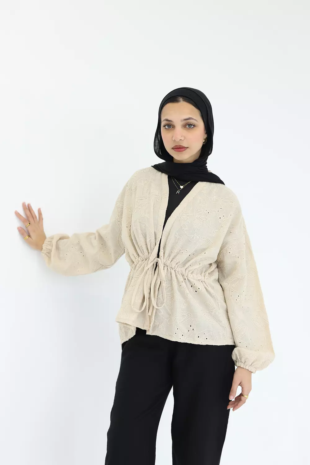 Beige flowered stomach cardigan image
