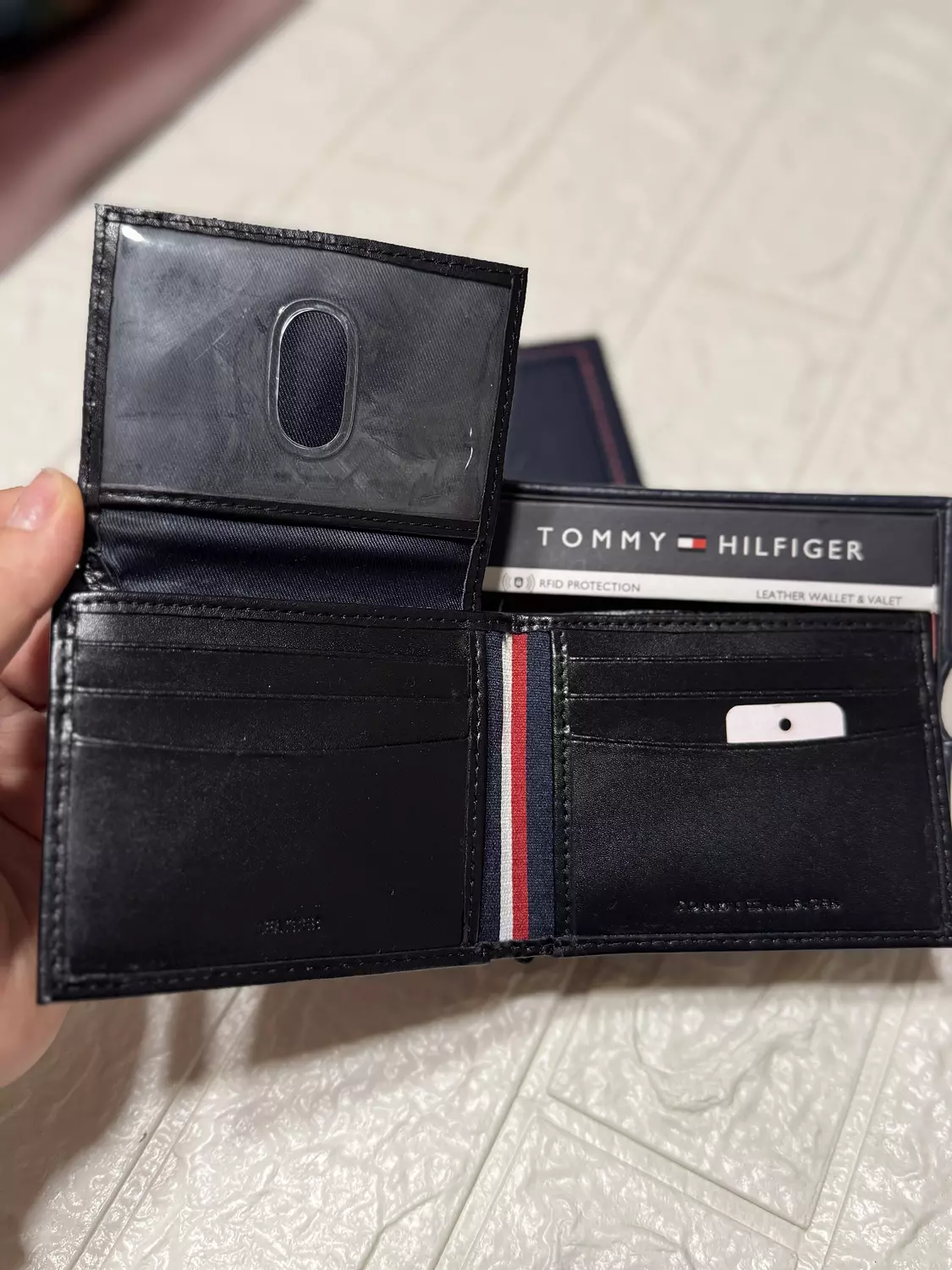 Tommy Hilfiger Men’s Black Leather Wallet – RFID Protected image
