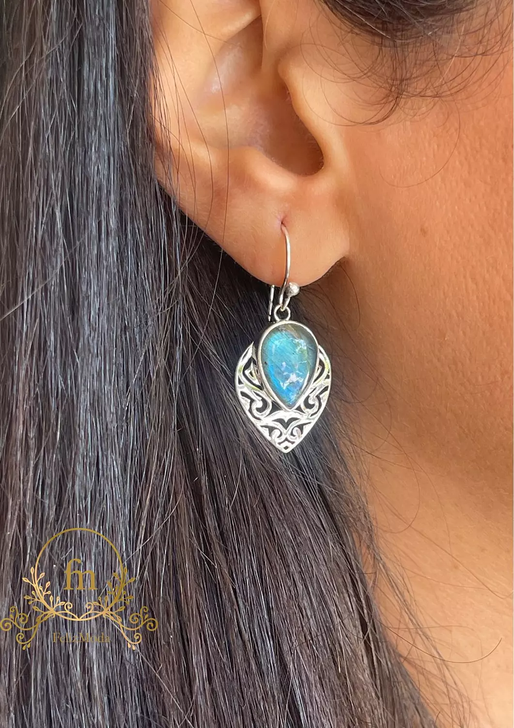 Unique designed silver earrings with gray & turquoise colored shades stone image