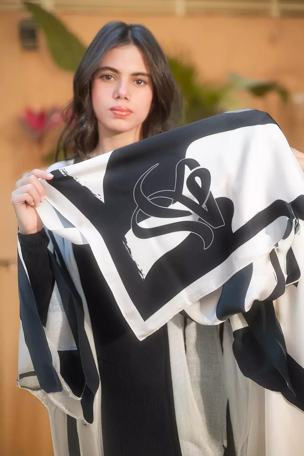 <p style="text-align: start"><span style="color: #aa7f2eff"><strong>روح Soul – Ramadan Satin Scarf (Black &amp; Off-White)</strong></span></p>