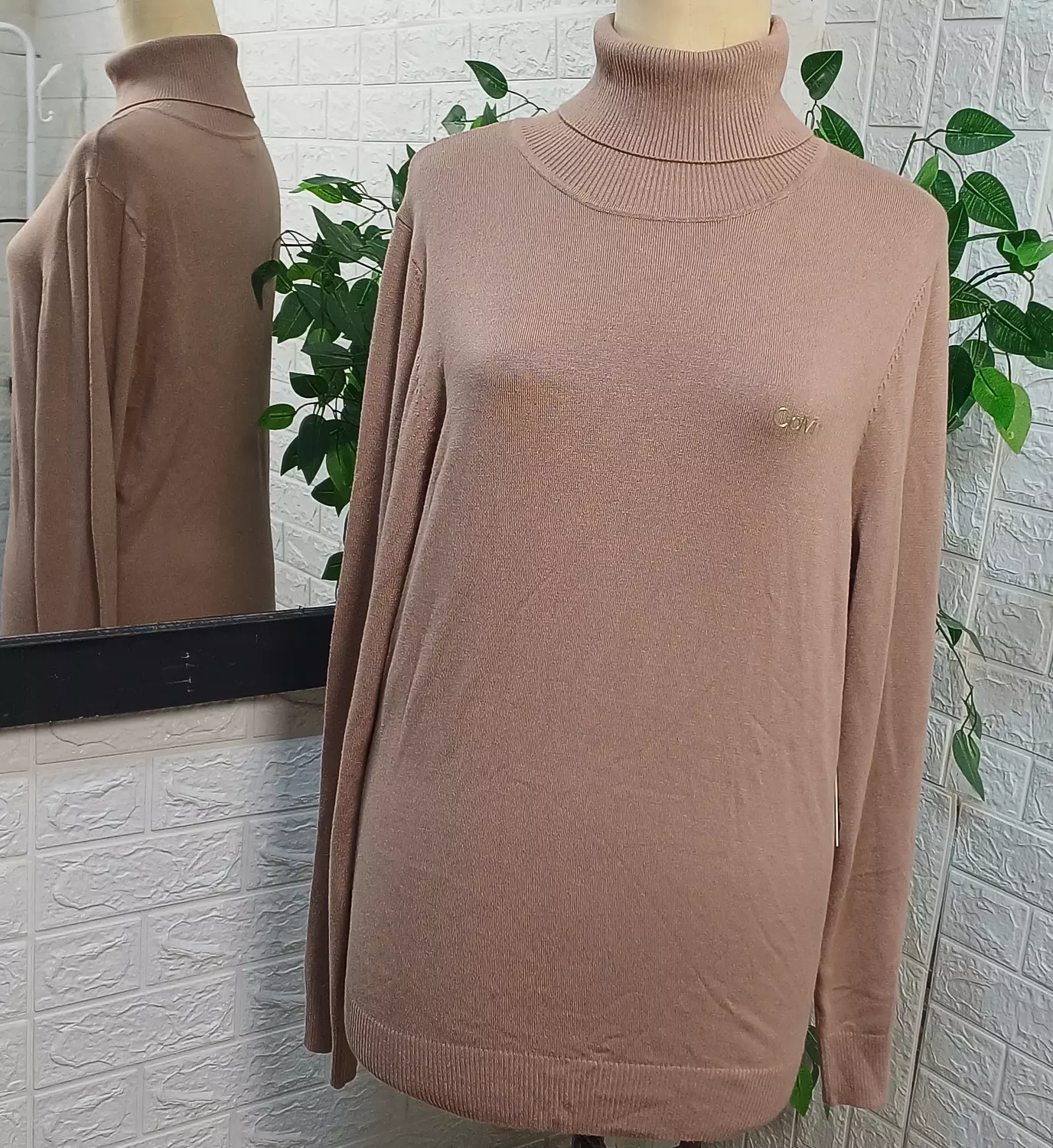 A soft neutral shade  beige  Calvin Klein  image