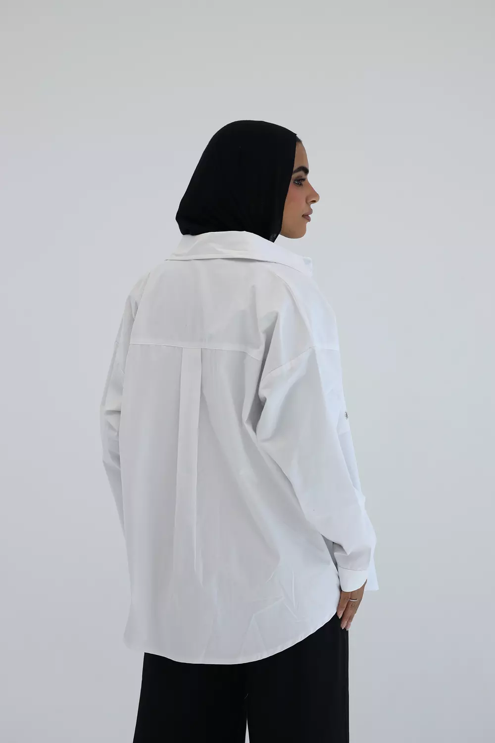 White shirt with metal circles on pockets 1