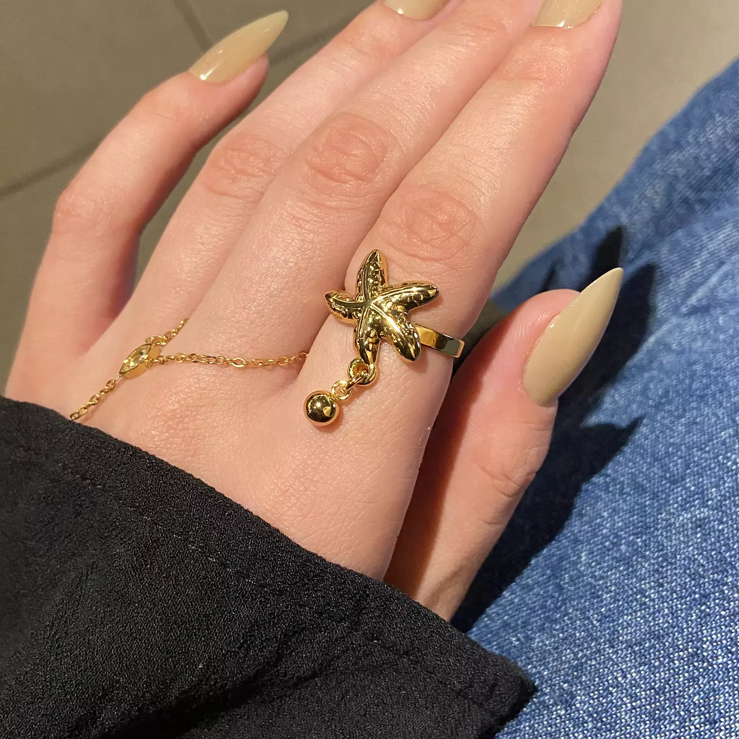 Star ring with dangling charm 1