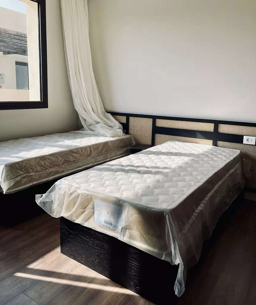 Two Beds with Headboard
