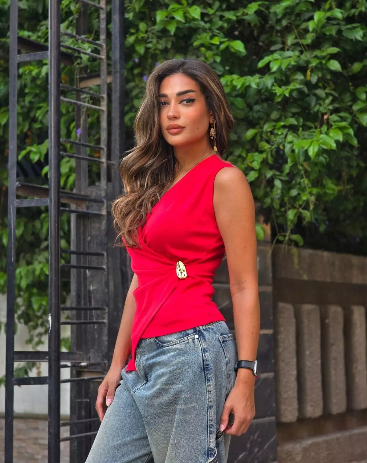 Red top with gold accessory  image