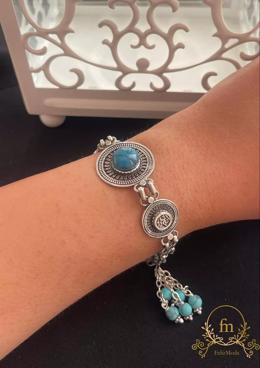 Blue stones silver bracelet with dangling stones image