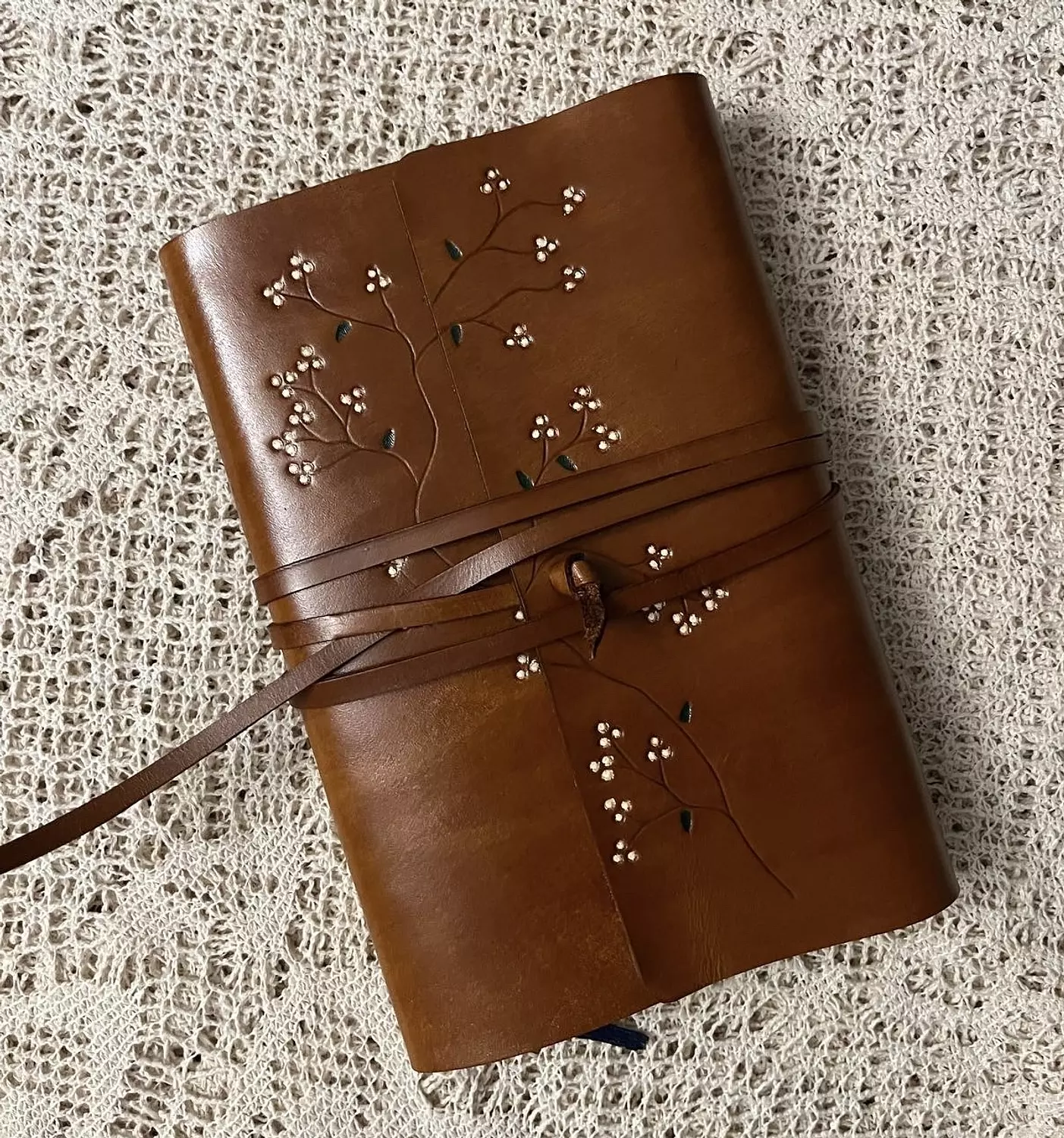 Tooled painted blossom vines leather cover with wraparound tie strap 2