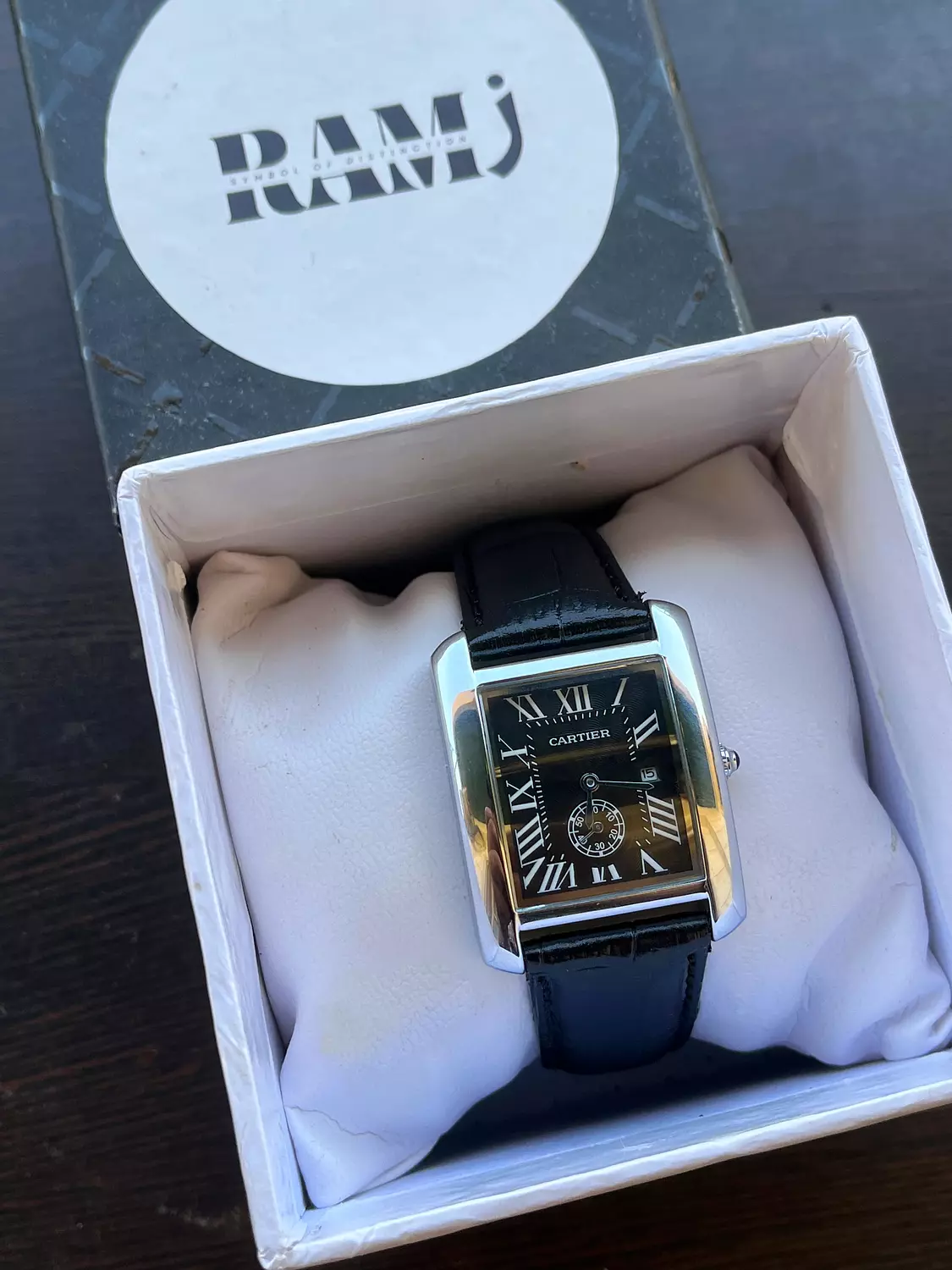 Cartier tank all black image