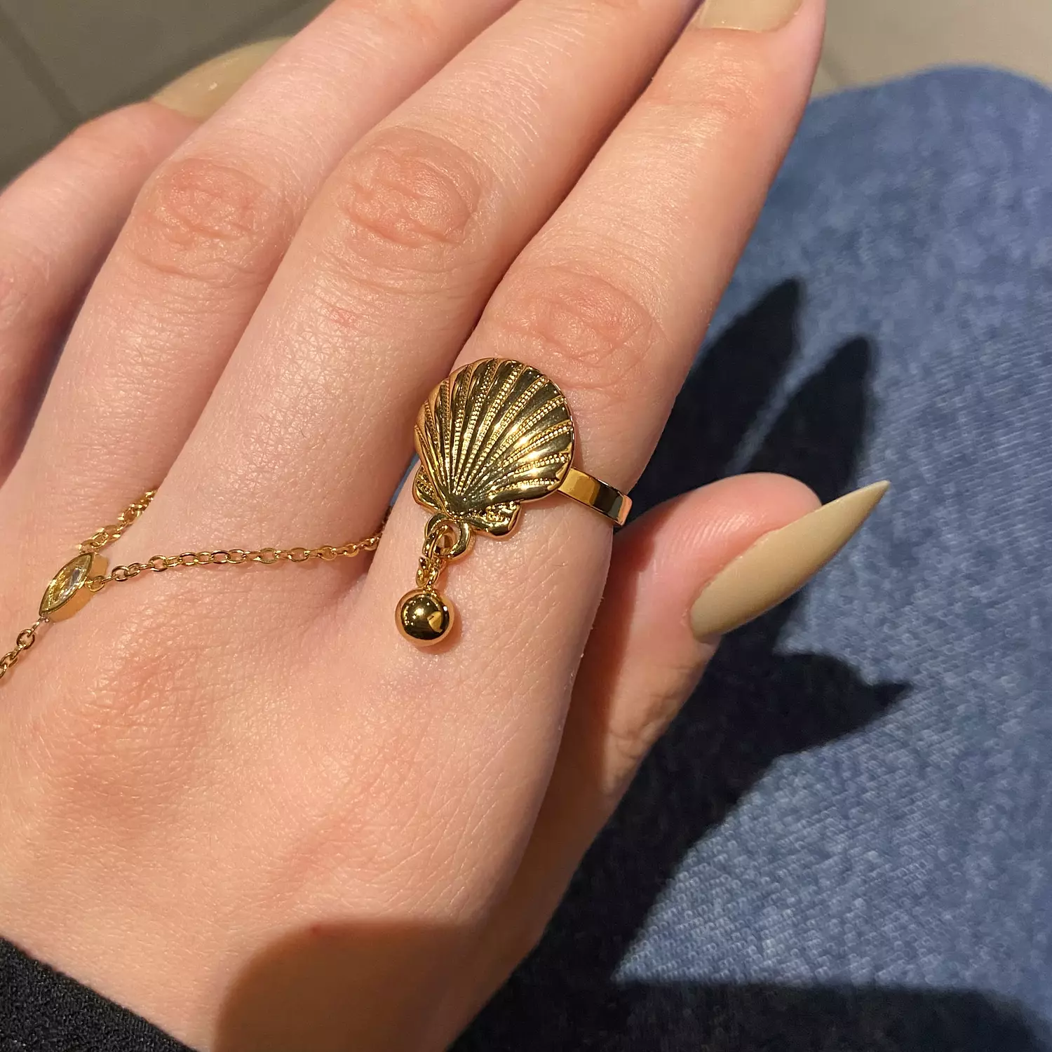 Shell ring with dangling charm 1