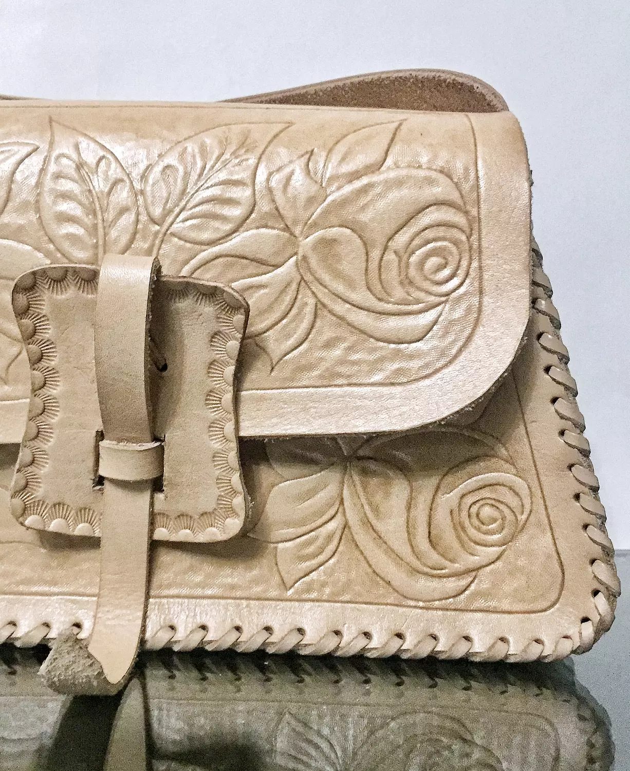 Tooled roses leather shoulder bag with strap closure  image
