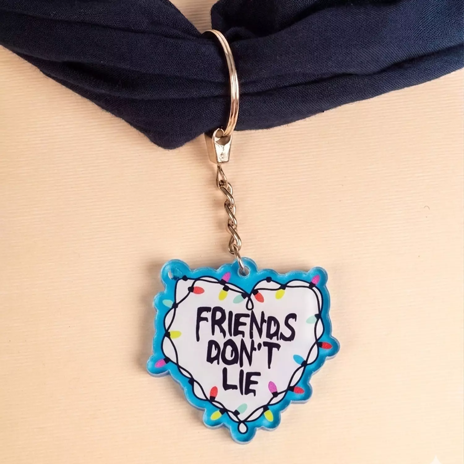 Friends don’t lie acrylic keychain image