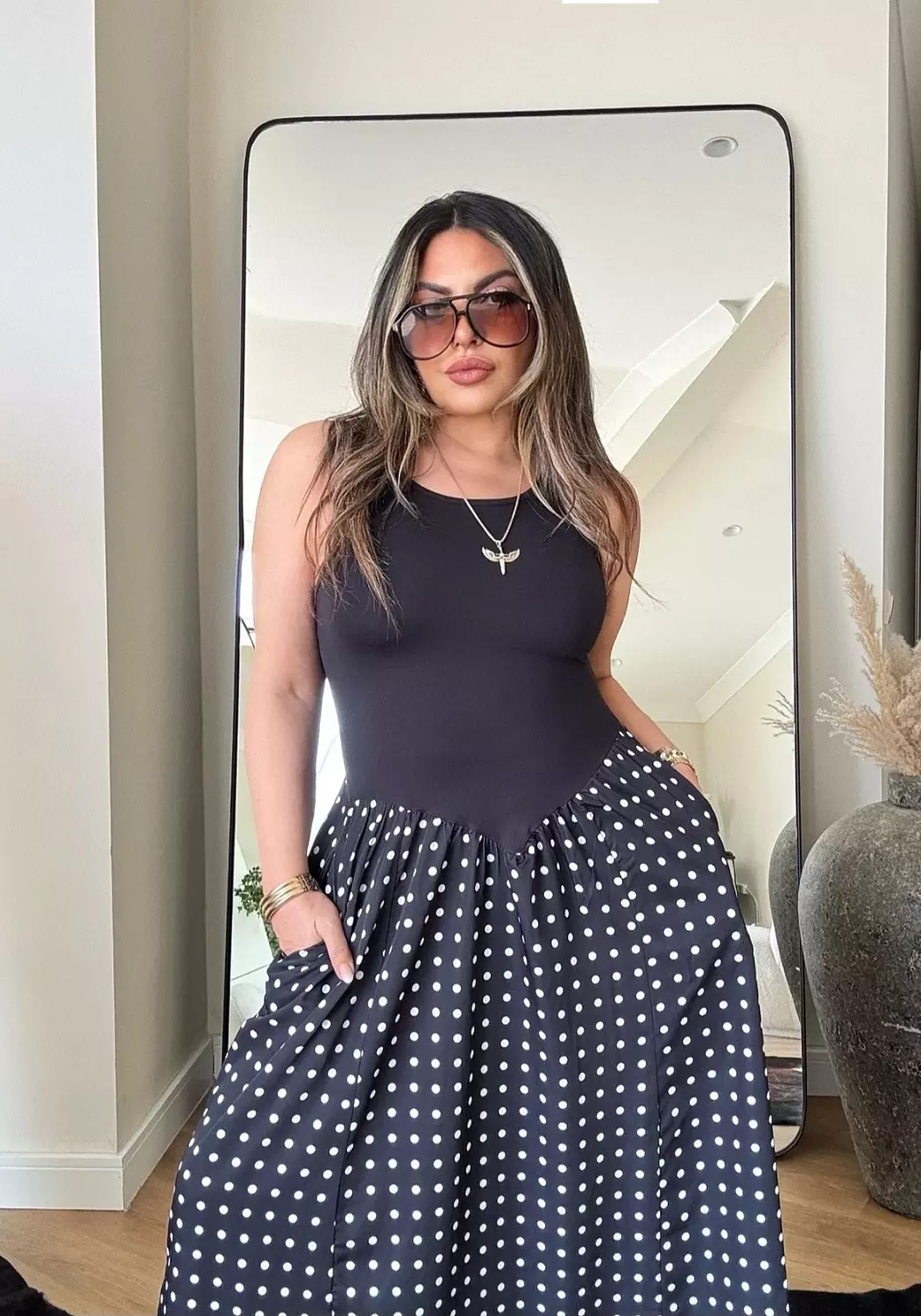 Black sleeveless polka dress 3