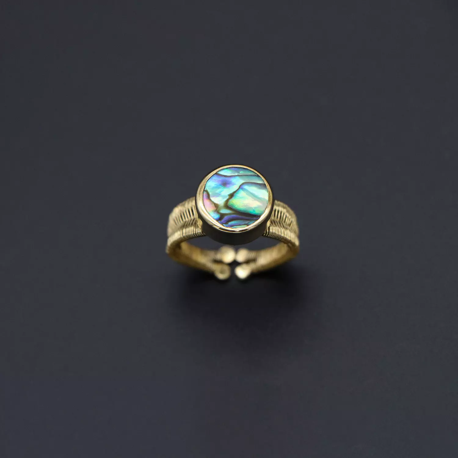 Brass ring with abalone shell. image